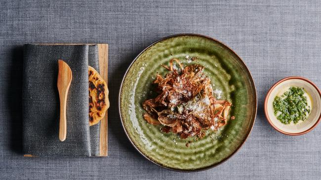 Winston Noosa’s aged Maleny beef tartare and leaves from the garden Picture: Darcy Starr