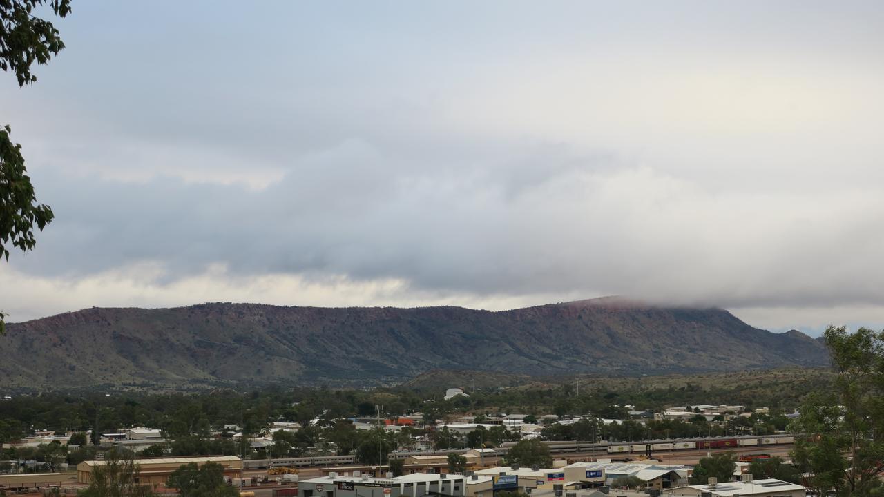 A cloud hangs over the West MacDonnell Ranges, Alice Springs. Picture: Gera Kazakov