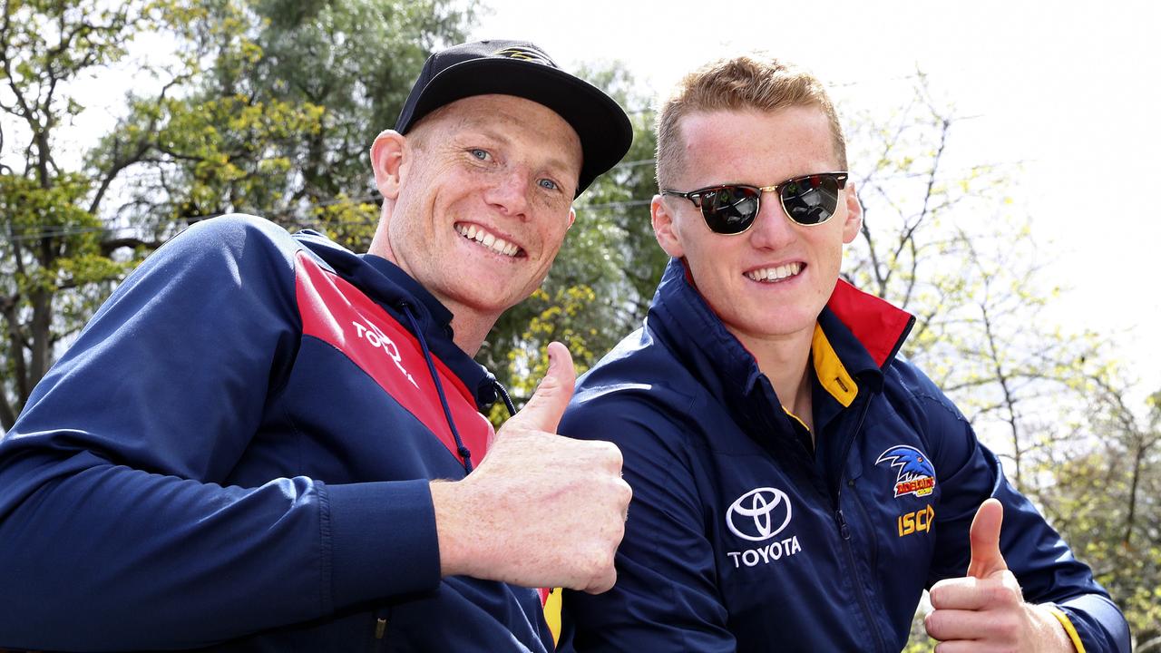 Reilly O’Brien (right) with Crows lead ruckman Sam Jacobs at the 2017 AFL grand final parade. Picture: Sarah Reed