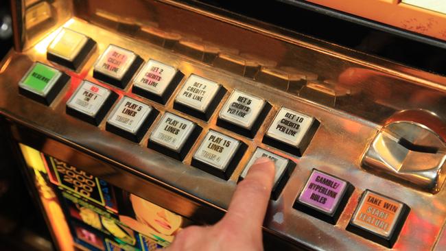 A man has pleaded guilty to fraud after stealing someone else’s winnings from a pokies machine. Photographer: Liam Kidston.