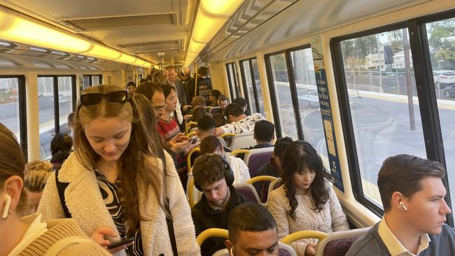 A packed three-carriage peak hour train on Tuesday morning