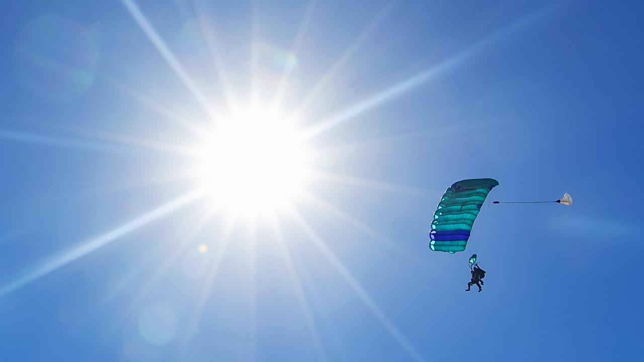 A skydiver in Airlie Beach has suffered a leg injury in a hard landing, just days after Whitsunday skydiver Douglas Ball died from his injuries. Photo Lachie Millard