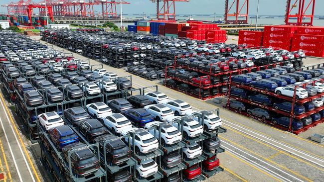 BYD electric cars waiting to be loaded on a ship at Suzhou Port, in China’s eastern Jiangsu Province on January 31. Picture: AFP) / China OUT