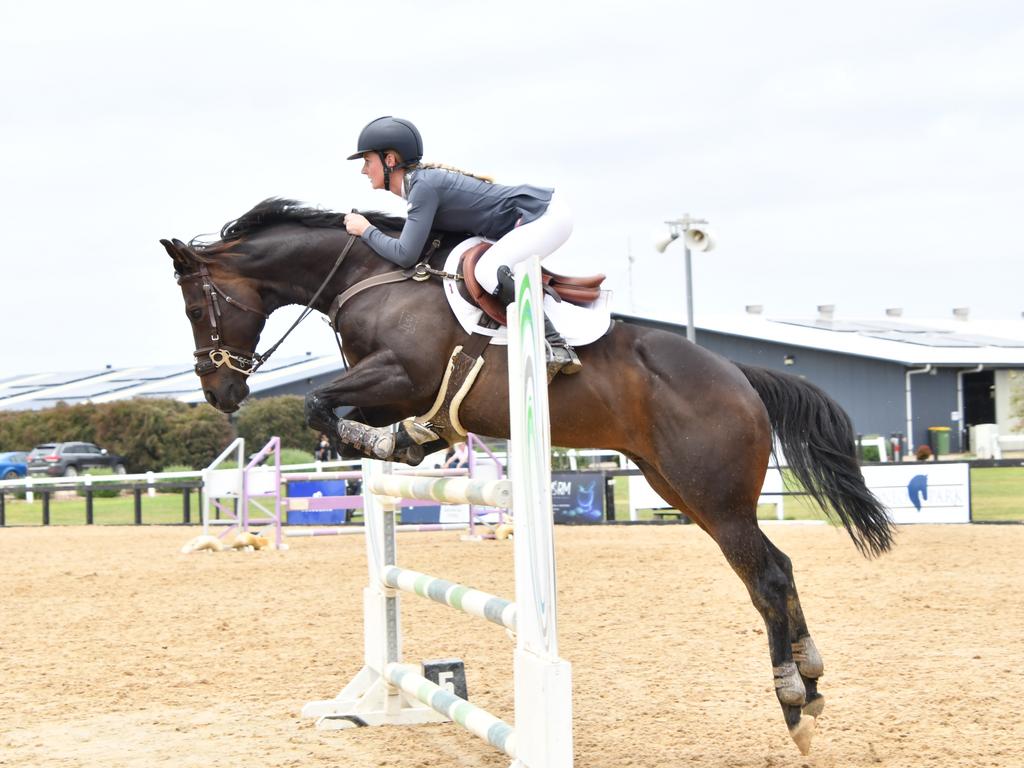 Top jockey Jamie Kah competing in a show jumping competition. Picture: Tazzie Eggins