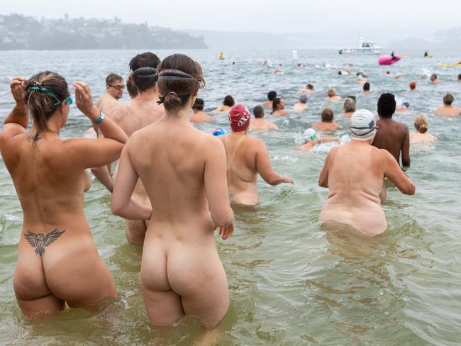 Swimming out into the cool waters of the harbour. Picture: Jordan Shields