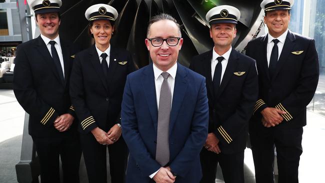 Alan Joyce with some Qantas pilots in Sydney yesterday. Picture: John Feder.