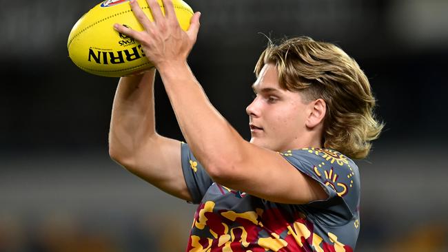 BRISBANE, AUSTRALIA - MARCH 24: Will Ashcroft of the Lions warms up ahead of the round two AFL match between Brisbane Lions and Melbourne Demons at The Gabba, on March 24, 2023, in Brisbane, Australia. (Photo by Albert Perez/AFL Photos via Getty Images)