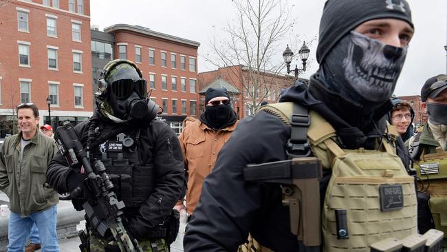 New Hampshire residents rally at the State House in Concord, calling on the government to re-open the state for business. Picture: AFP