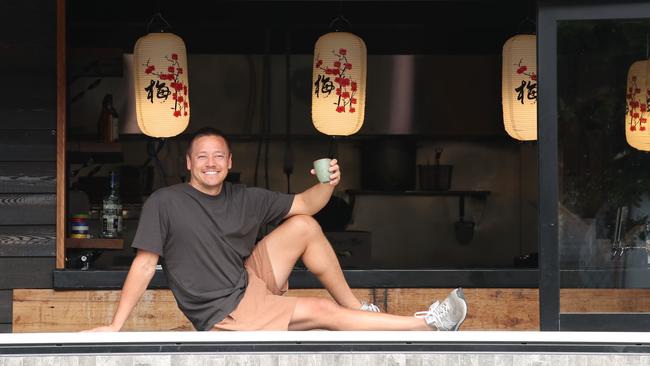 Scott Imlach is opening up a new Japanese restaurant at Nobbys called Okawari House. Coffee Shop owner Marcus Wilkins (in window) will also be getting 10sqm for morning trade. Picture Glenn Hampson