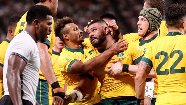 Will Genia (L) gave the Wallabies a spark when he came off the bench. Picture: Getty