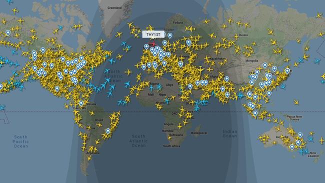 Flight radar image from Monday morning shows a smattering of aircraft in Australia’s airspace compared with swarms of planes over North America and Europe. Picture: FlightRadar24