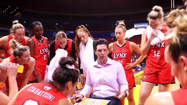 Lynx head coach Ryan Petrik speaks to his team during the round eight clash against Sydney Flames. Picture: Mark Kolbe/Getty Images