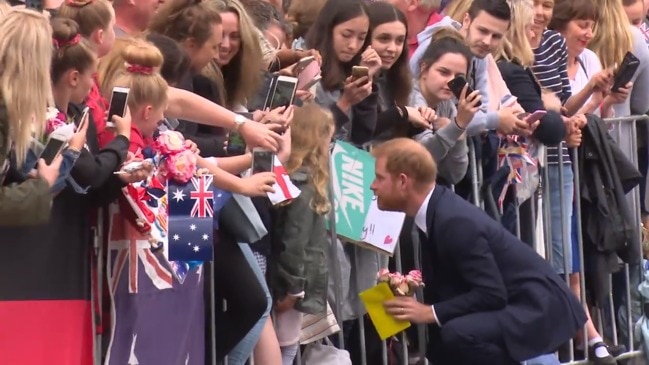 Harry and Meghan greeted by crowds in Melbourne at Government House