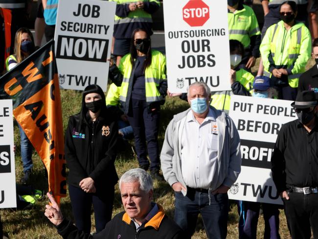 SYDNEY, AUSTRALIA - NewsWire Photos SEPTEMBER 23, 2021: Michael Kaine (National secretary TWU) speaks to media and  transport workers who are on strike outside Startrack in Minchinbury. Up to 2000 StarStruck workers will strike for 24 hours as they fight for job security and against outsourcing, causing potential problems for national supply chains.Picture: NCA NewsWire / Damian Shaw