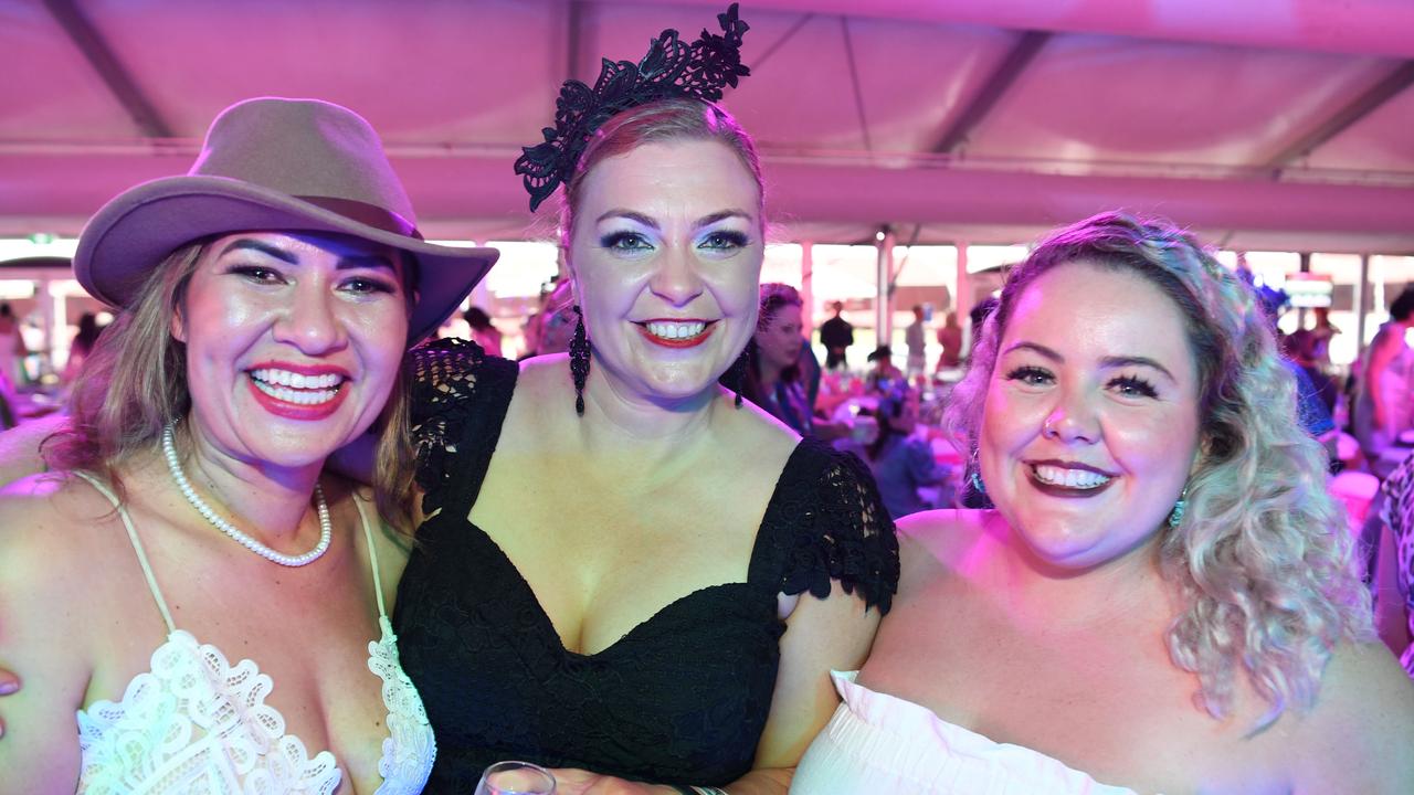 Joy Joy, Clare Summers and Genna Ryan on the dance floor at Darwin Ladies Day. Picture: (A)manda Parkinson