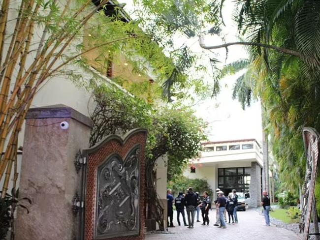 Agents stand outside the Miami home of Sean “Diddy” Combs on the day of the raid. Picture: US Department of Justice