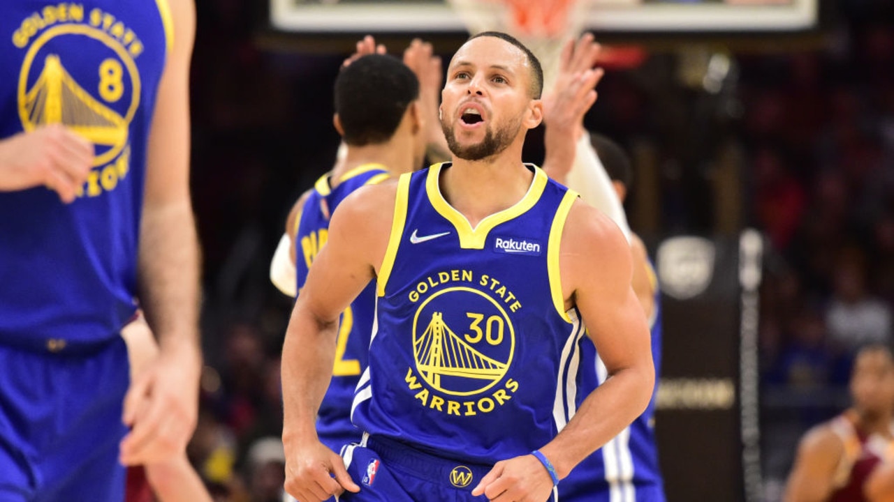 CLEVELAND, OHIO - NOVEMBER 18: Stephen Curry #30 of the Golden State Warriors celebrates during the second half against the Cleveland Cavaliers at Rocket Mortgage Fieldhouse on November 18, 2021 in Cleveland, Ohio. The Warriors defeated the Cavaliers 104-89. NOTE TO USER: User expressly acknowledges and agrees that, by downloading and/or using this photograph, user is consenting to the terms and conditions of the Getty Images License Agreement. (Photo by Jason Miller/Getty Images)