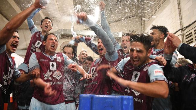 APIA Leichhardt players celebrate their FFA Cup Round of 16 win over Melbourne Victory. Picture: AAP