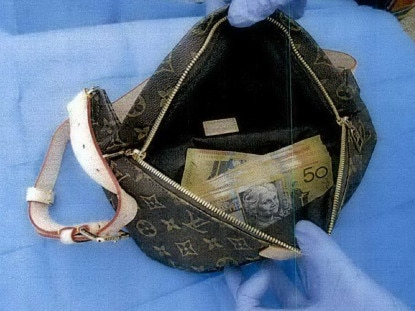 The Louis Vuitton bag contained cash believed to be proceeds of crime.