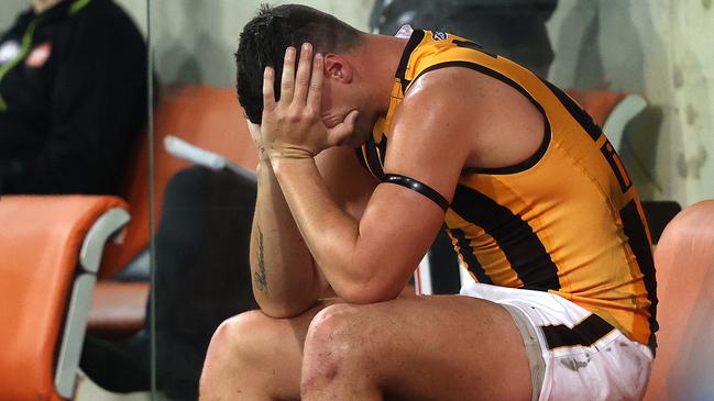 An emotional Jon Patton on the bench after his injury. Picture: Phil Hillyard