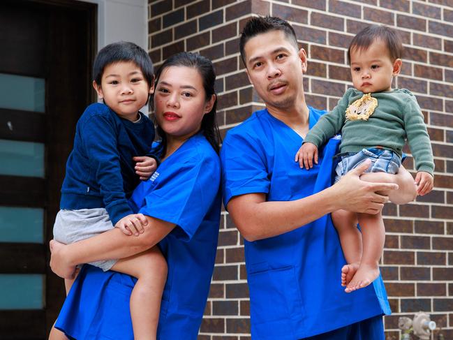 ON HOLD FOR THE DAILY TELEGRAPH SPECIAL.  Daily Telegraph. 22, March, 2024.**Embargoed for The Daily Telegraph. Future West campaign. On Hold until publication**  Do not use unless you speak to the pic desk.Nurses Lucy Anne and Jerwin Jacoba, with their children, Vaughn, 3, and Vincent, 1,at home, in South Wentworthville, today.(Story is about how he has to live out west and commute to RPA).Picture: Justin Lloyd.