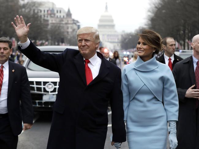 President Donald Trump waves to supporters as he walks the parade route with first lady Melania Trump after being sworn in at the 58th Presidential Inauguration January 20, 2017 in Washington, D.C. Picture: Getty