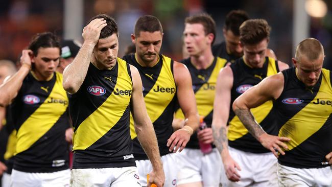 Trent Cotchin leads his dejected Tigers teammates off Spotless Stadium after last week’s loss to GWS. Picture: Getty Images