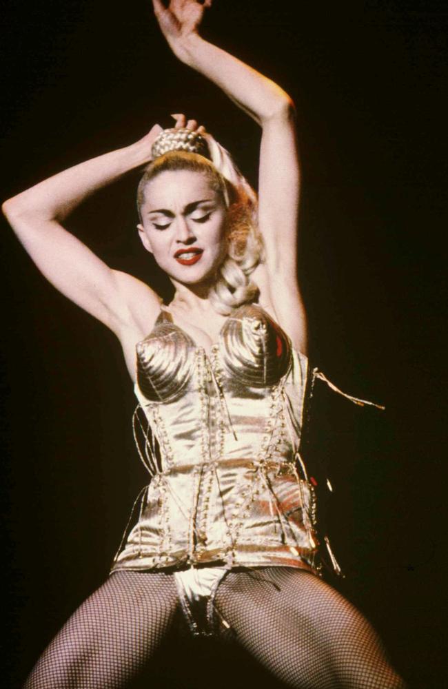 Madonna in a Jean Paul Gaultier cone bra corset as part of her 1990 Blonde Ambition world tour. Photo: australscope