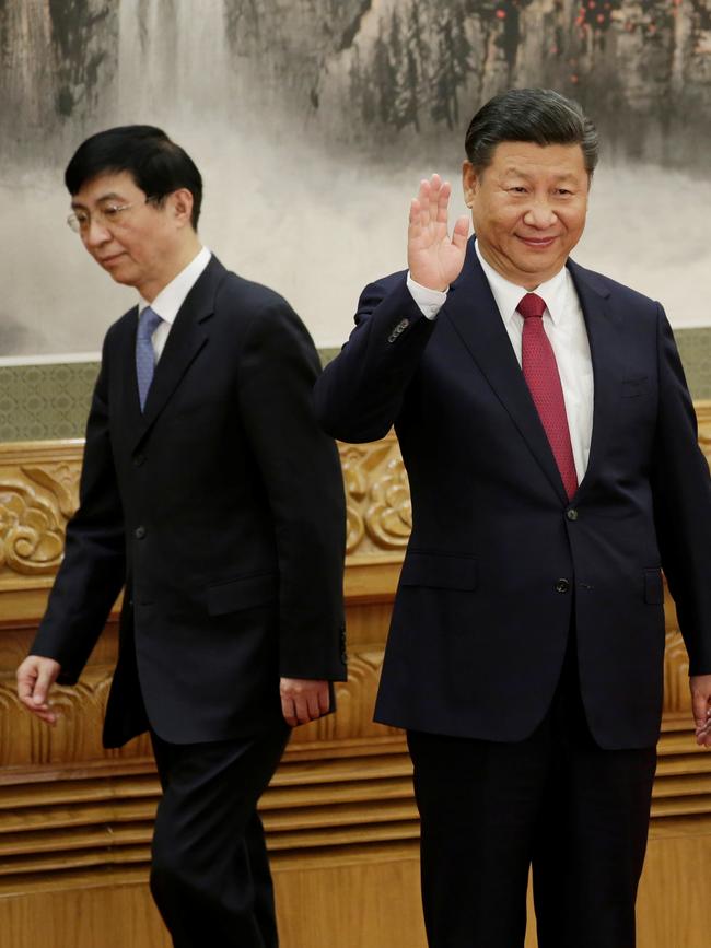 New Politburo Standing Committee member Wang Huning with President Xi Jinping.