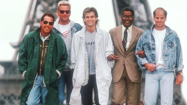 Tennis Player Andre Agassi Stands With His Coach Nick Bollettieri, Brother Philip, And Manager Bill Shelton. Photo By John Russell/Getty Images.