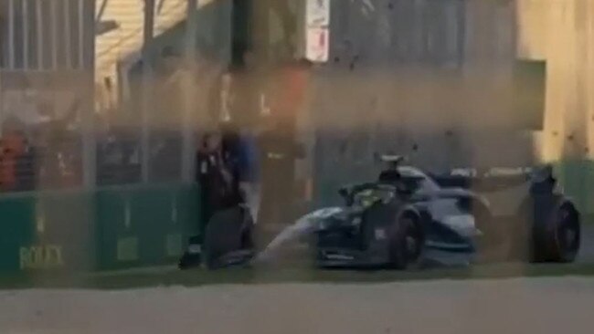 Cars still fly around while F1 fans invade the track at the GranD Prix. Picture: 7 News