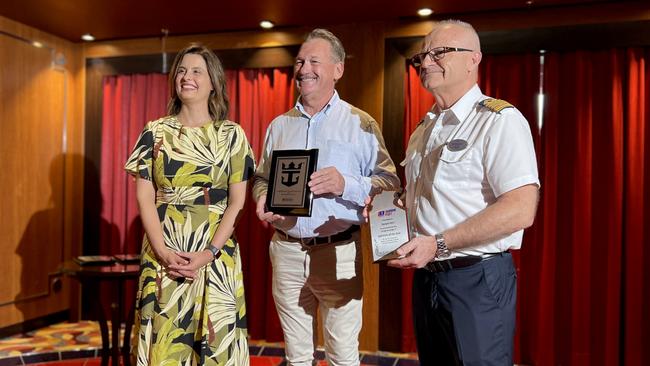 Hospitality and Tourism CEO Suzana Bishop, Darwin Port CEO Peter Dummett and Quantum of the Seas Captain Krzysztof Szynkarczuk conduct a plaque exchange to mark the cruise liner's first voyage to Darwin. Picture: Fia Walsh.