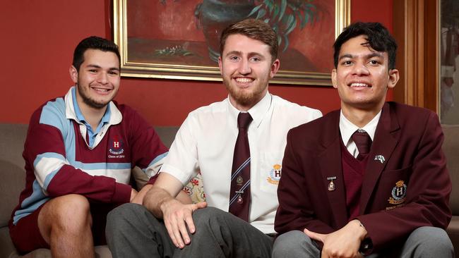 Homebush Boys High School year 12 students Michael Lopes, 18, Charlie McClean, 18, and Shahi Uddin, 19. The school has had a drop in enrolment of 15 per cent over five years. Picture: Jonathan Ng