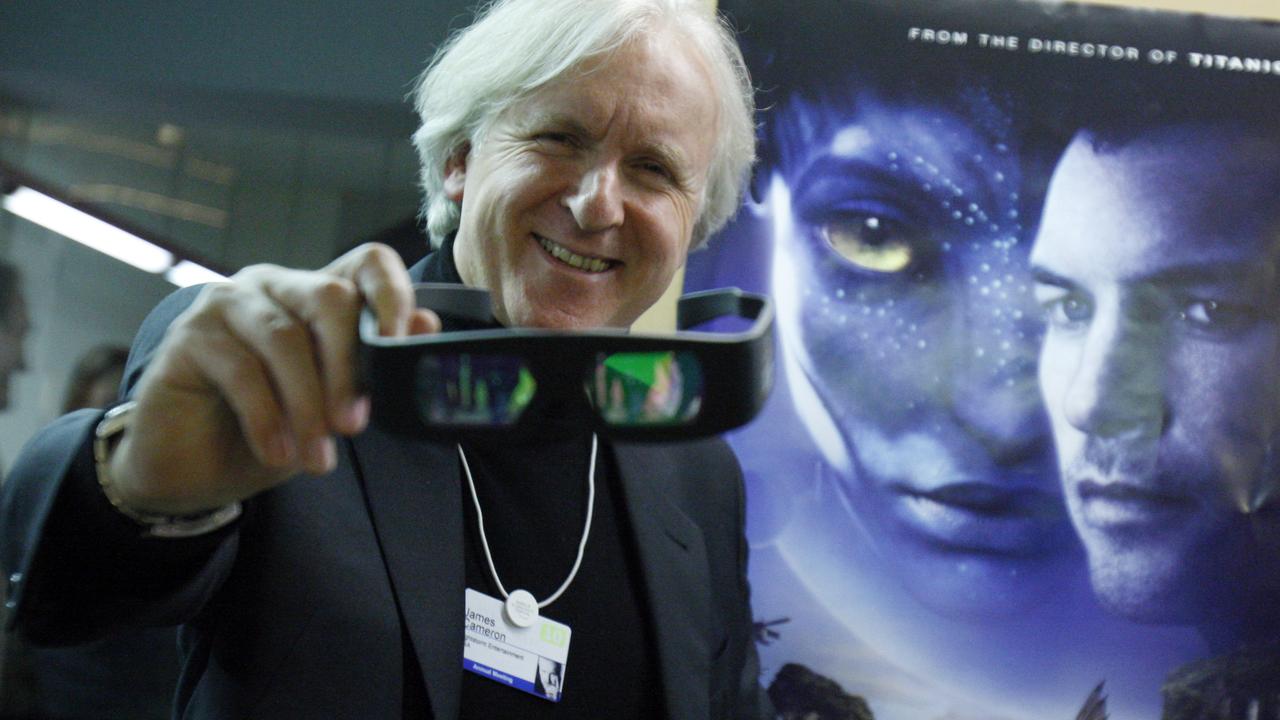 Director James Cameron with the 3D glasses people would wear while watching Avatar.