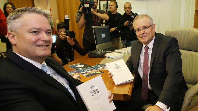 Minister for Finance Senator Mathias Cormann and Treasurer Scott Morrison with the budget papers. Picture Kym Smith