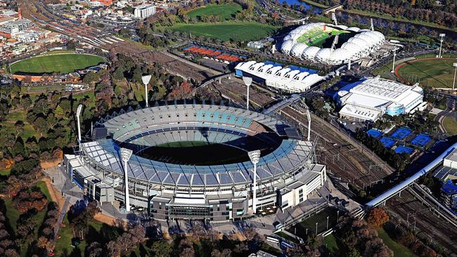 A view of Melbourne’s sports precinct, with the MCG in the foreground and AAMI Park in the background.