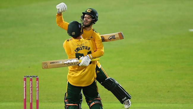 Ben Duckett celebrates a Vitality Blast win with Dan Christian.