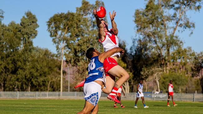 Federal's Braydon Weily takes a big mark over Souths' Thomas Gorey. Picture: Charlie Lowson