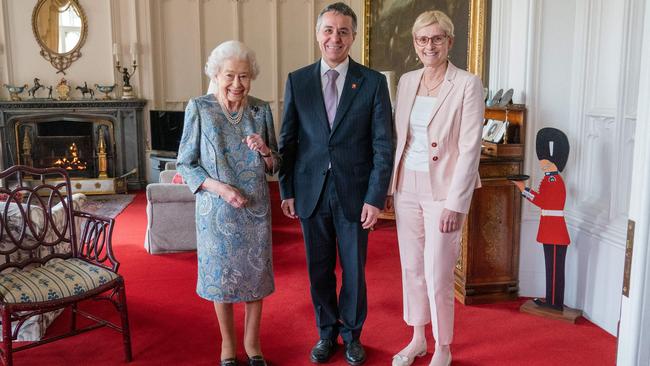 Queen Elizabeth II poses for a photograph with Ignazio Cassis and his wife Paola Cassis. Picture: AFP