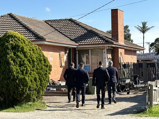 Detectives at a property in Hampton Park where a man was killed. Picture: Josephine Quattrocchi