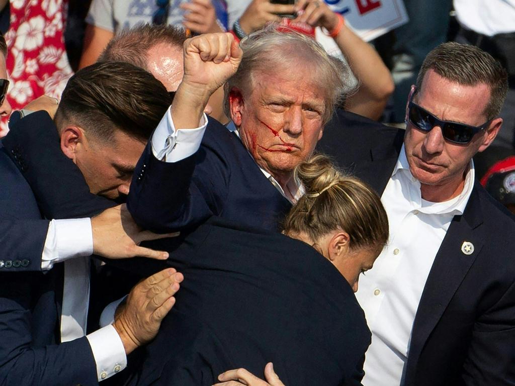 The attempted assassination of Donald Trump on July 13 in Pennsylvania added to a portrayal of a candidate who was unafraid and strong; Biden handed the Democratic nomination to his Vice President Kamala Harris soon after. Picture: Rebecca Droke/AFP/AFP Pictures of the Year 2024