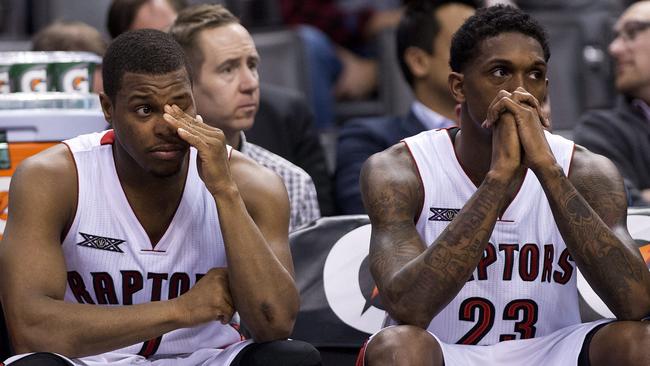 Toronto Raptors guard Kyle Lowry, left, and guard Louis Williams, right, on the bench after being defeated by the Brooklyn Nets.