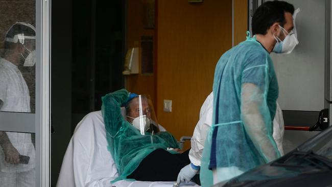 A coronavirus patient at the emergency department of the Cardarelli hospital in Naples last week. Picture: AFP