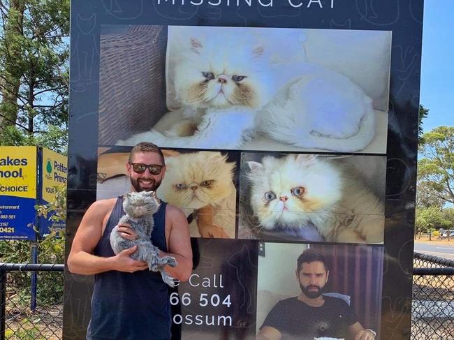 Patterson Lakes man Brett Cooper was reunited with his pet cat Possum, missing for six weeks.