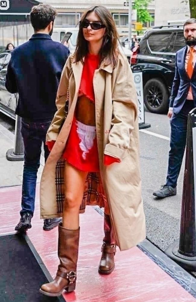 In the hours leading up to the Met Gala, the Mark Hotel was one of the most star-studded destinations in New York. Emily Ratajkowski arrived at the hotel ahead of the event looking fashion forward in a torn red dress over white briefs. She completed the look with Miu Miu leather boots and a beige trench coat. Picture: BACKGRID Australia