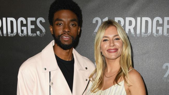 Chadwick Boseman and co-star Sienna Miller. Picture: Getty