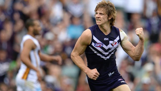 Nat Fyfe celebrates kicking one of his goals against Hawthorn. Picture: Daniel Wilkins