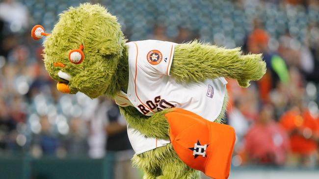 Houston Astros mascot Orbit shoots T-shirts into the crowd at