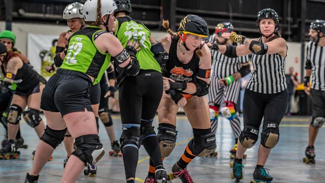 The Bogey Rollers (green) and the Harbour Hellcats (black) will kick off the 2023 Newcastle Roller Derby League season. Photo: Mark Zouroudis