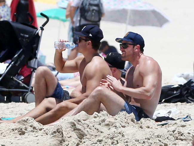 Mielczarek hit the beach with a mate at the Gold Coast the day after the split.